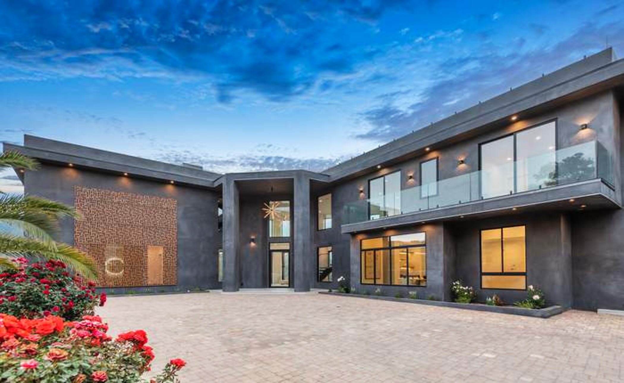 Contemporary entry courtyard at twilight